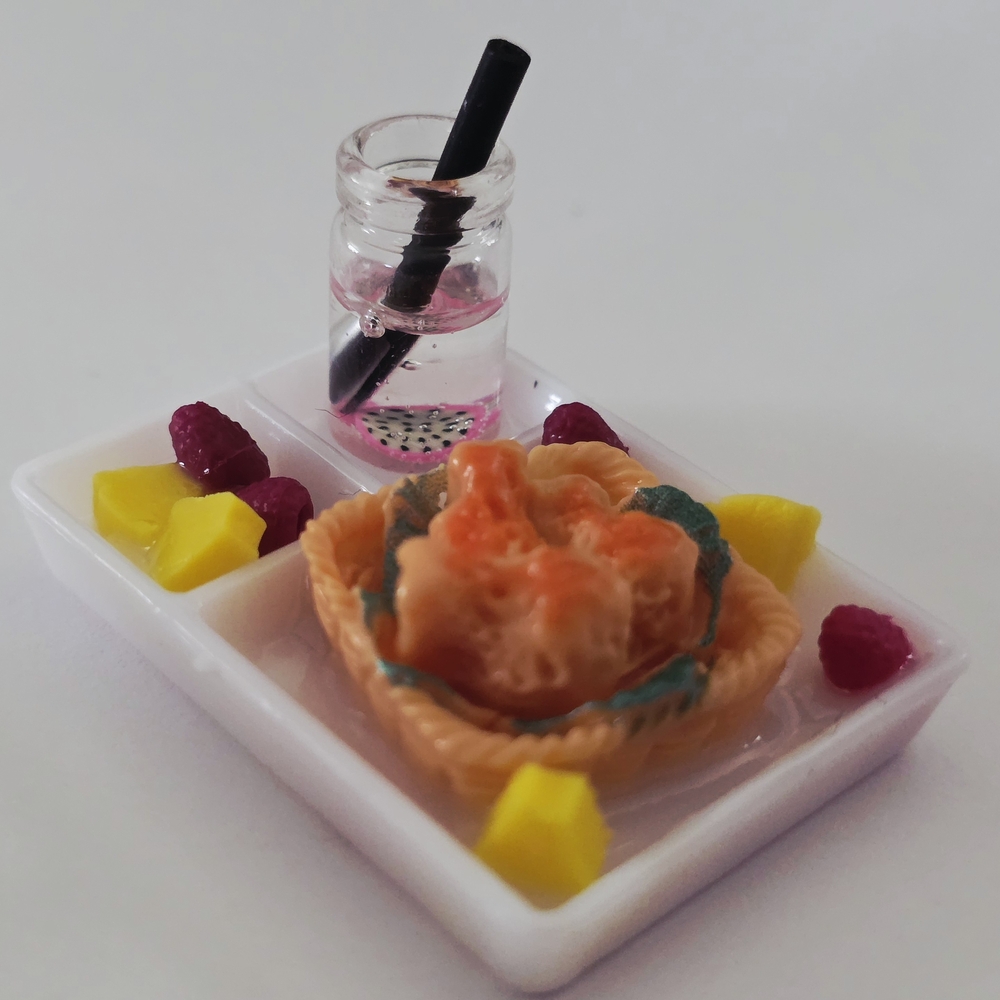 Elegant Dining Set with Pink Drink and Fruit